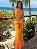 Conjunto Tropical de Dos Piezas: Top Halter Desbocado y Falda Maxi Fruncida