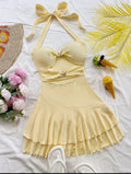 Vestido Playero Soleil – Escote Halter y Falda de Volantes