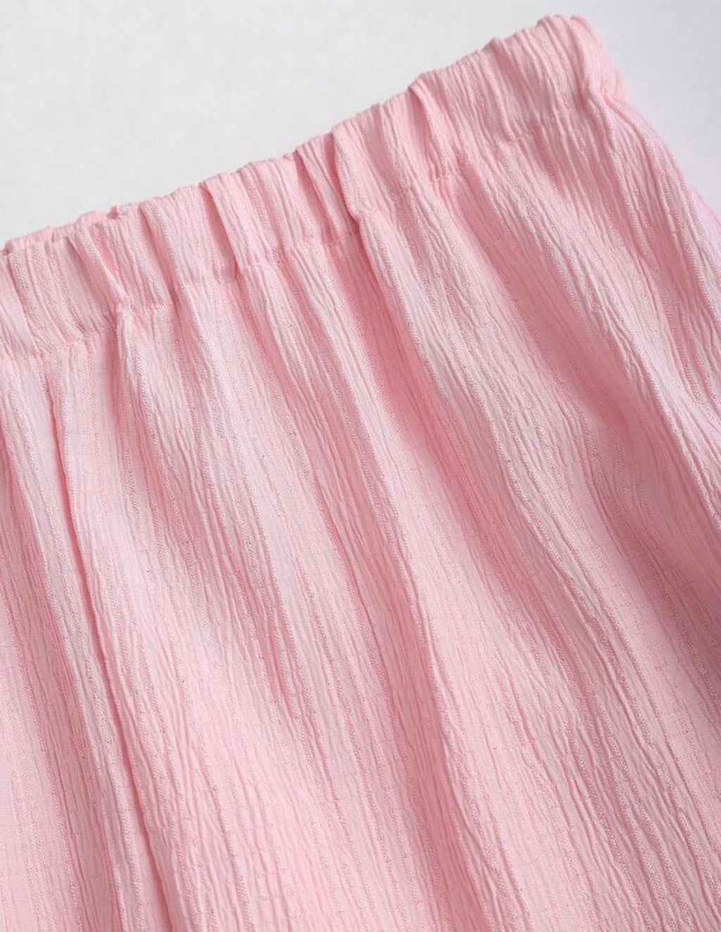Conjunto Bella Plisé – Top Halter Peplum y Pantalón Wide Leg Flotante