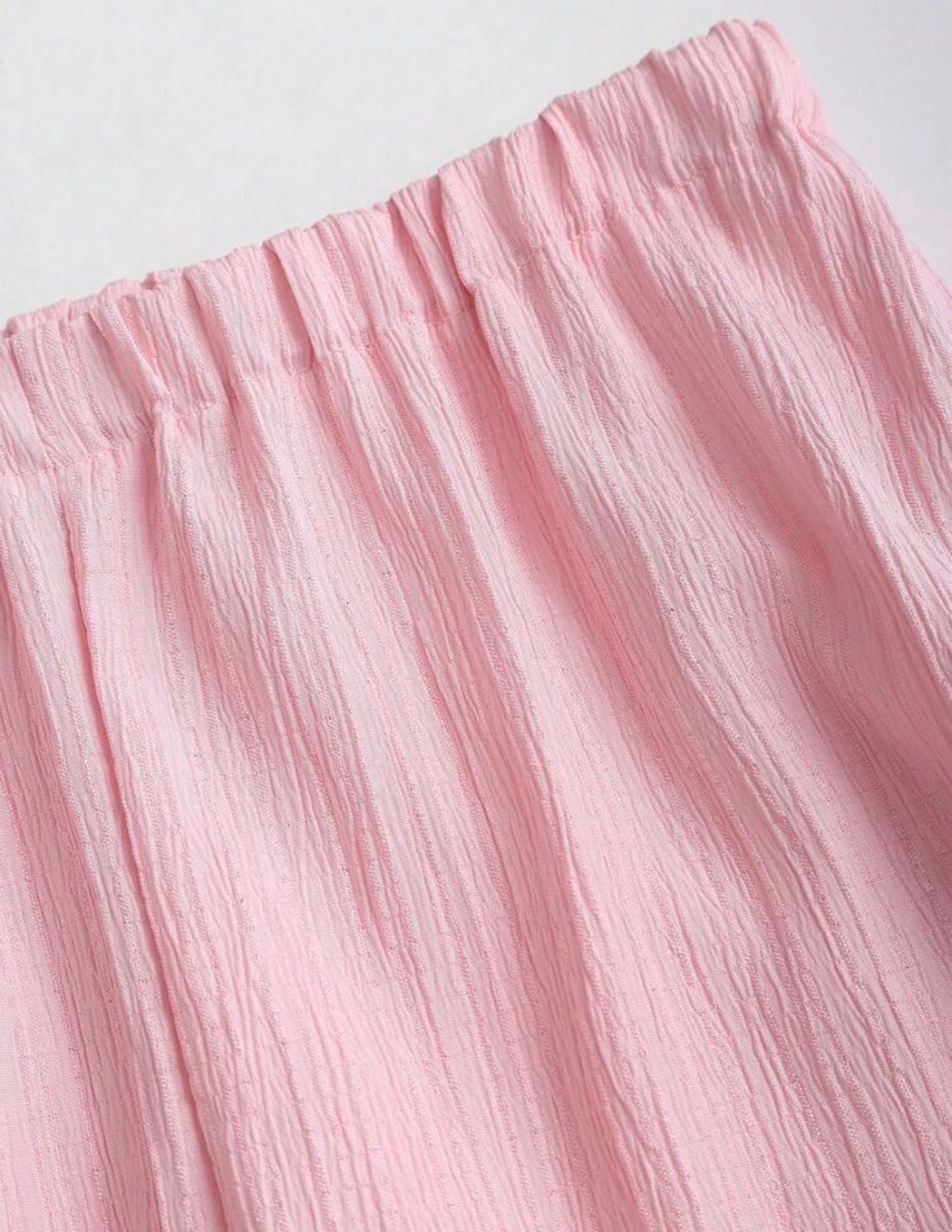 Conjunto Bella Plisé – Top Halter Peplum y Pantalón Wide Leg Flotante
