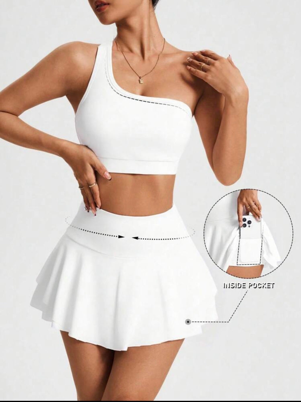 Conjunto Deportivo Asimétrico con Falda-Shorte – Elegancia y Dinatismo