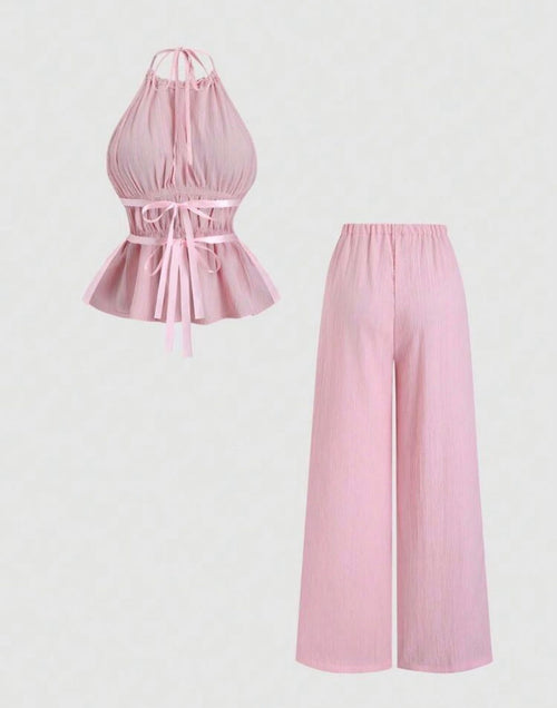 Conjunto Bella Plisé – Top Halter Peplum y Pantalón Wide Leg Flotante