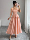 Vestido Maxi Rosa Pastel con Espalda Cruzada y Nido de Abeja