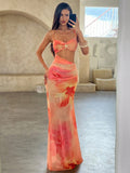 Vestido Maxi Cut-Out Tropical: Estampado Hibisco y Detalle de Estrella de Mar